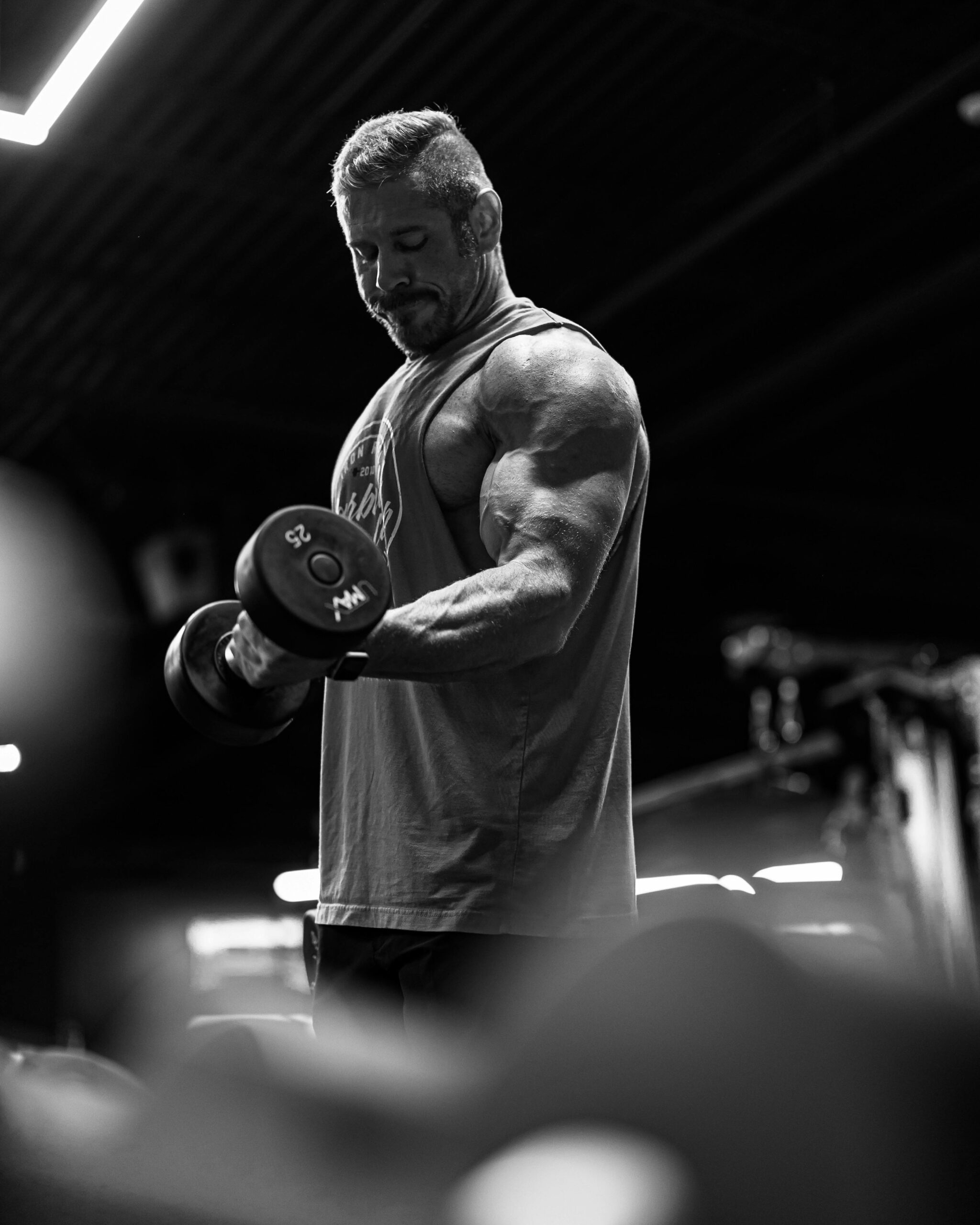 marcy home gym man lifting a barbell