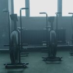 woman using elliptical machine