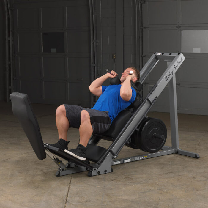 how to use hack squat machine